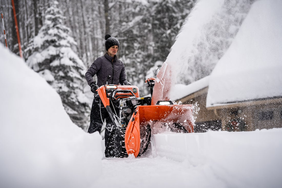 Ariens Alpine Edition snow blower throwing heavy snow